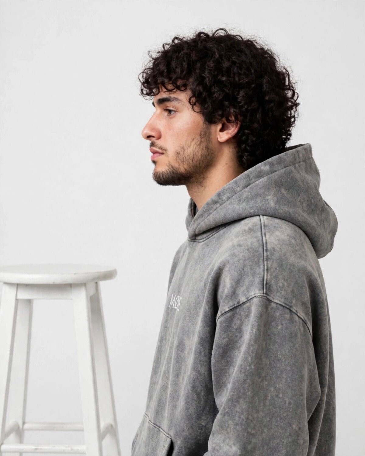 MØDE Signature Hoodie in acid-wash gray, side view — oversized unisex fit