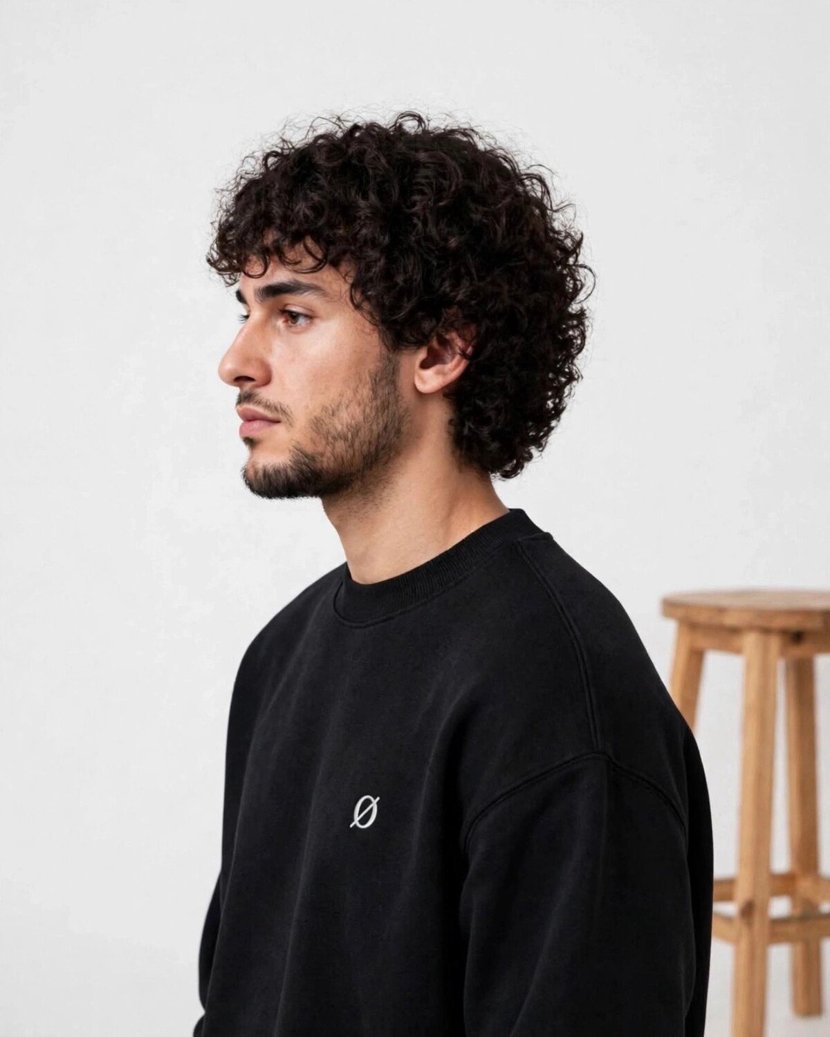 MØDE Premium Sweatshirt in black, side view — oversized unisex fit